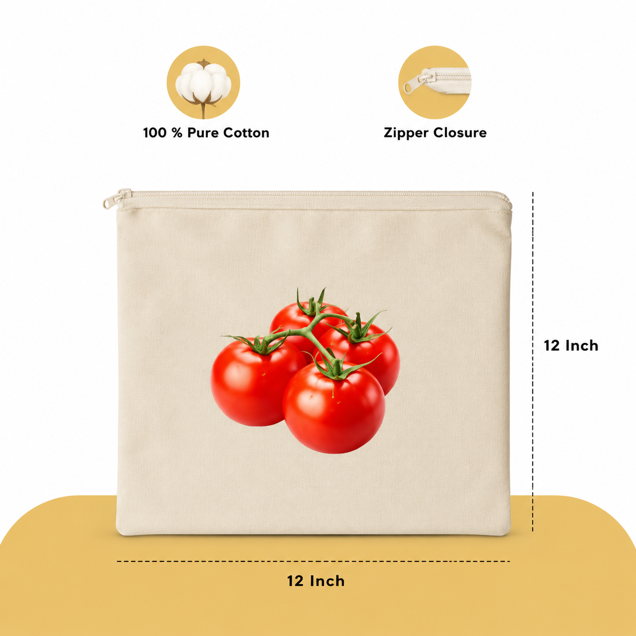 Beige canvas zipper pouch with a graphic of four red tomatoes on the front, shown with dimension labels indicating 12 inch width and height, plus icons for 100% pure cotton and zipper closure.